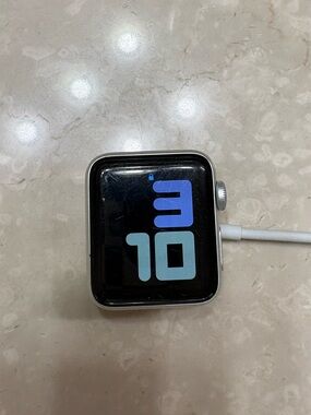 Apple Series 3 Watch and Charging Cable